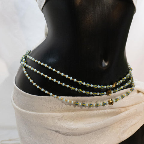 AfroBeads Waist Beads in Tribal Seeds, Powder Blue and Crystal Gold  Tilted View