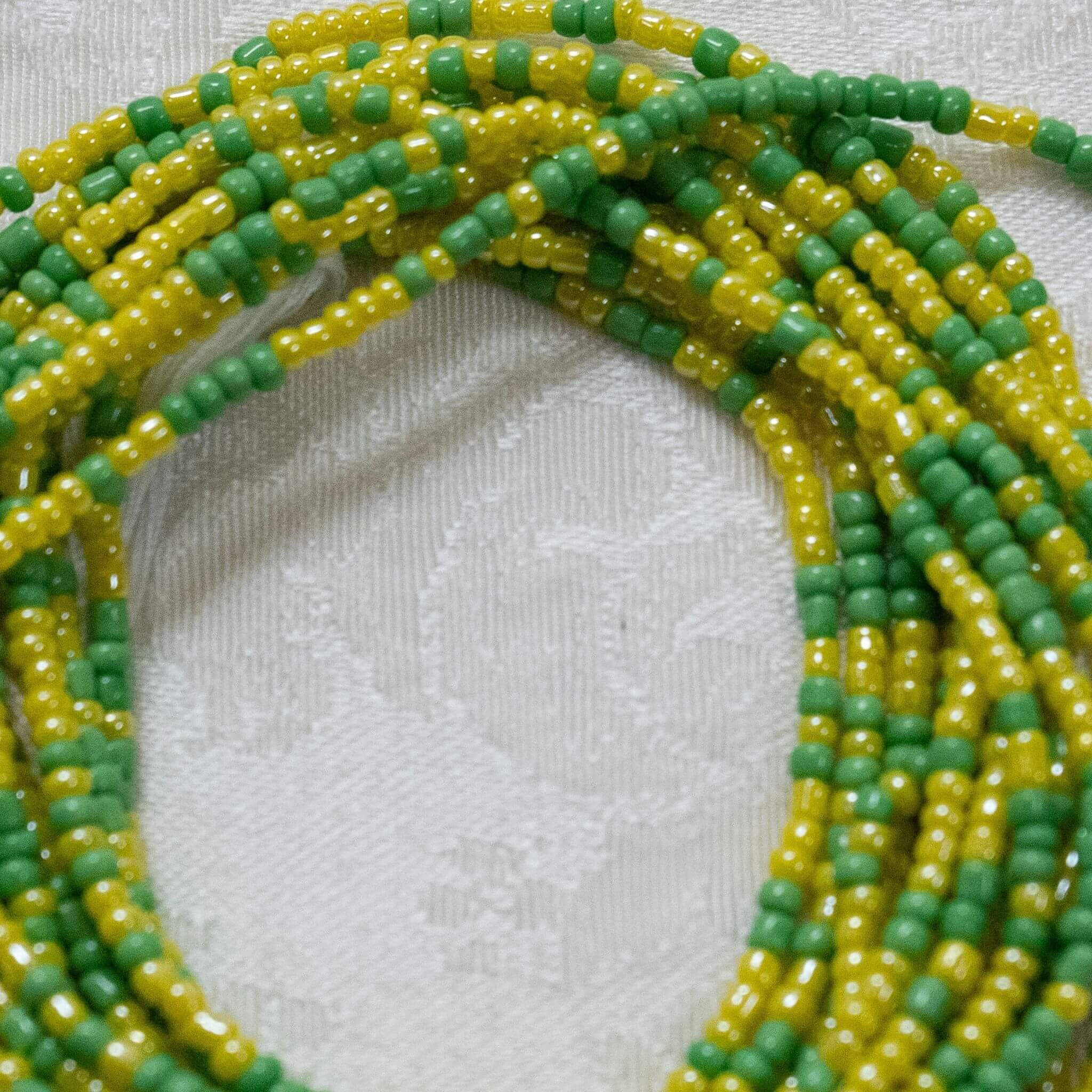 AfroBeads Waist Beads in Spring Green and Maize Yellow Seeds  Close View