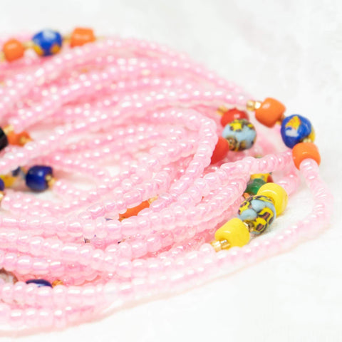 AfroBeads Waist Beads in Tribal Seeds with Charming Pink Close View