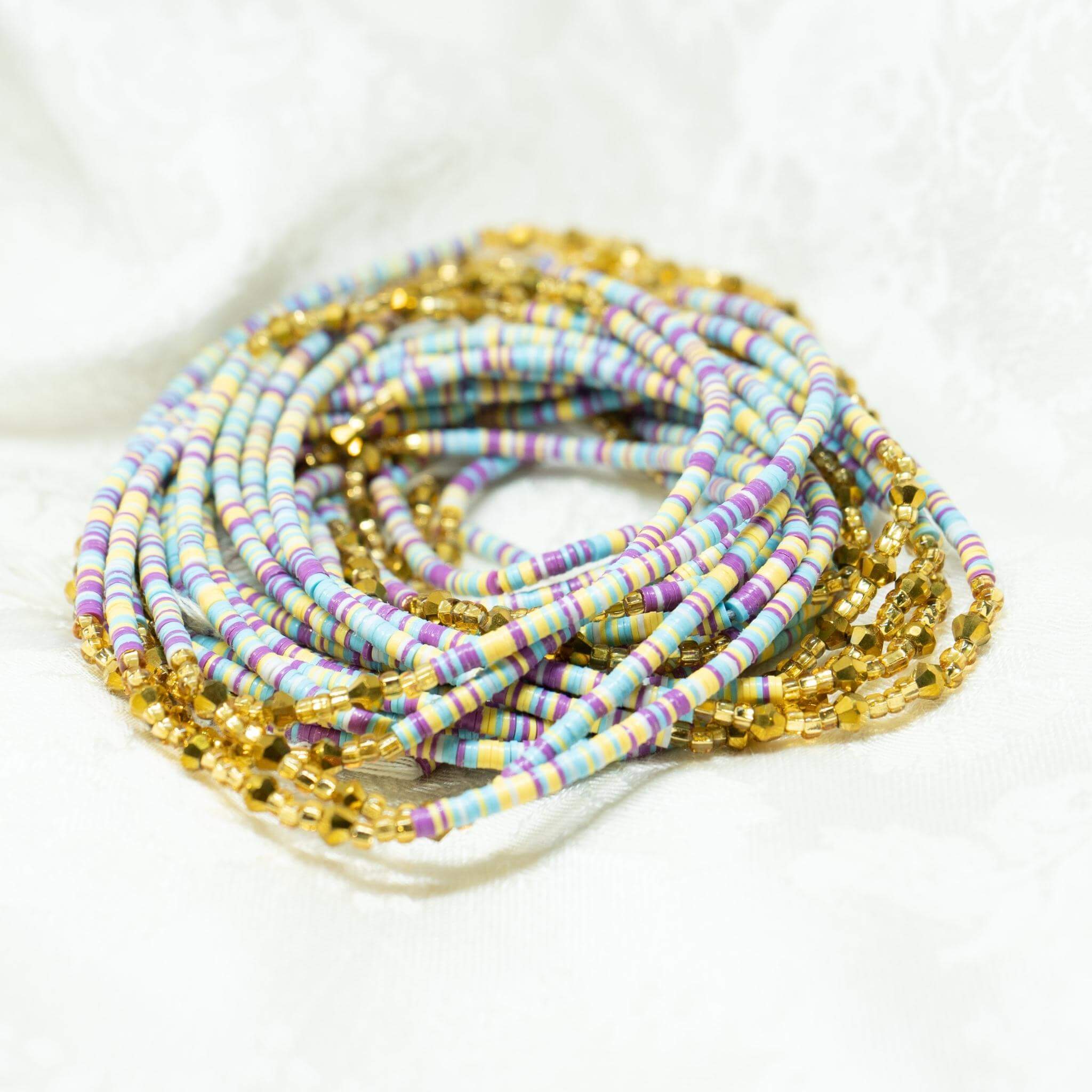 AfroBeads Waist Beads in Cyan, African Violet, Sunshine Yellow, and Crystal Gold  Strand