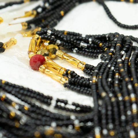 AfroBeads Waist Beads in Seeded Black with Ruby Red and Glow-In-The-Dark Butterfly Close View